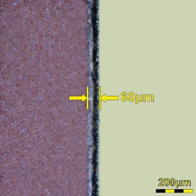 圖2. 杜邦Pyralux®AC雷射切割後邊緣的顯微鏡影像(300倍)熱影響區尺寸為60µm